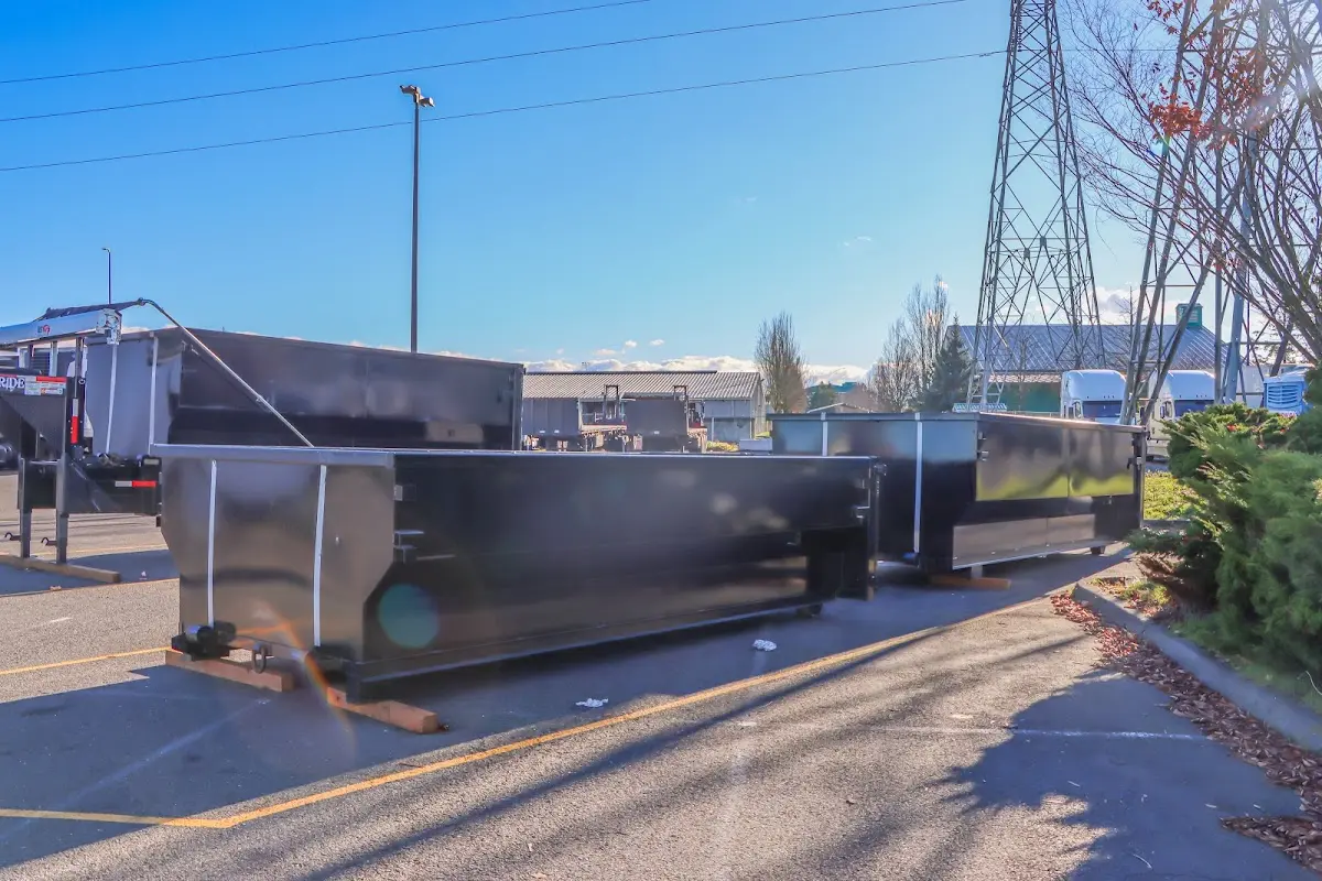 Roll-off dumpster ready for waste disposal at job site for 2 Yard Dumpster Rental in Hudson